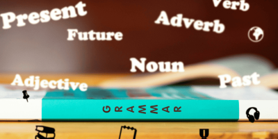 grammar-4 A grammar textbook with various words associated with grammar floating around it