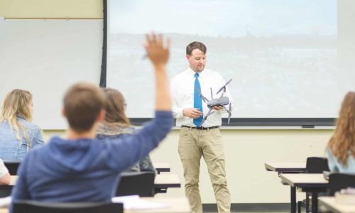 Instructor lecturing their adult learners