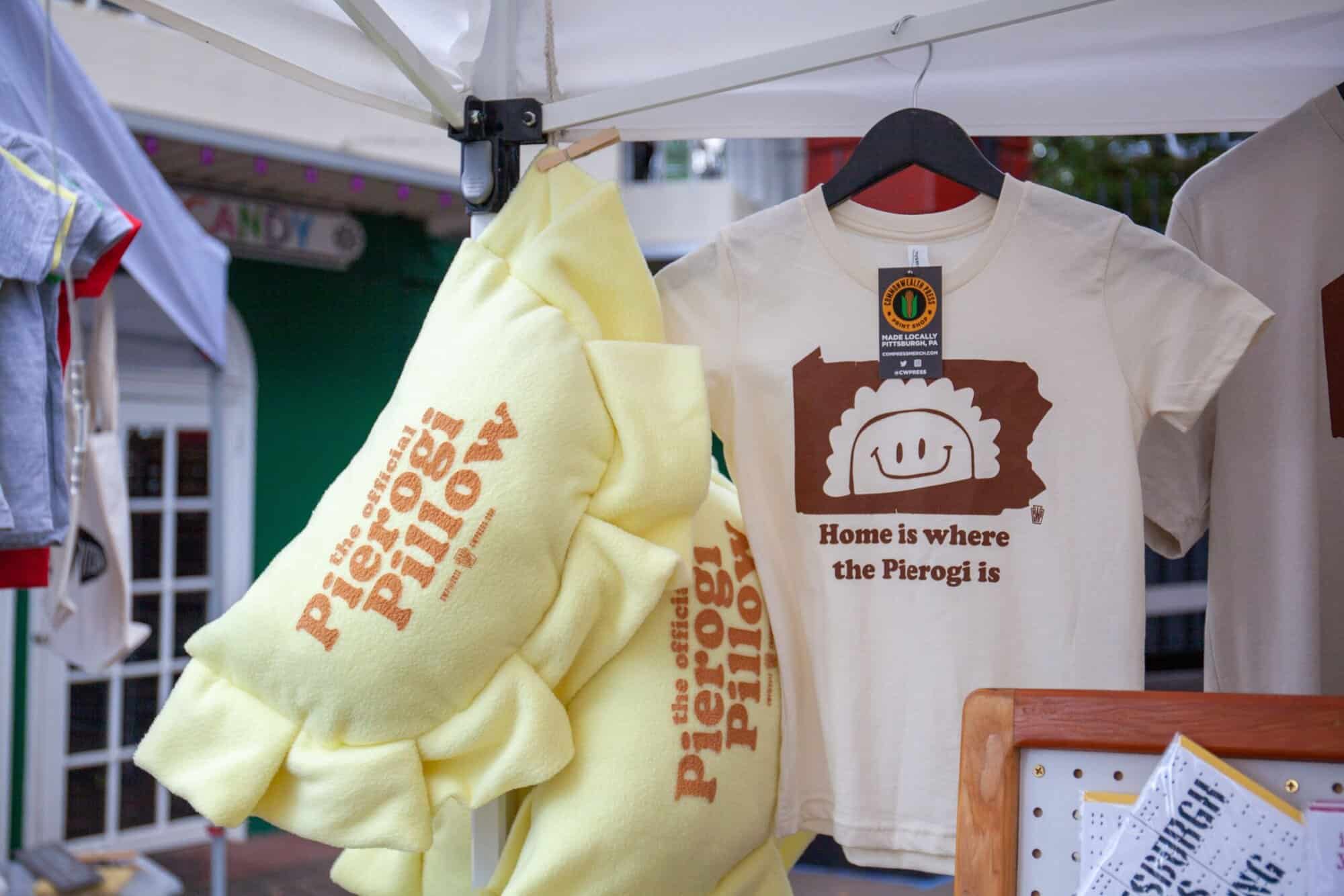 A pierogi pillow and shirt for sale at the festival.