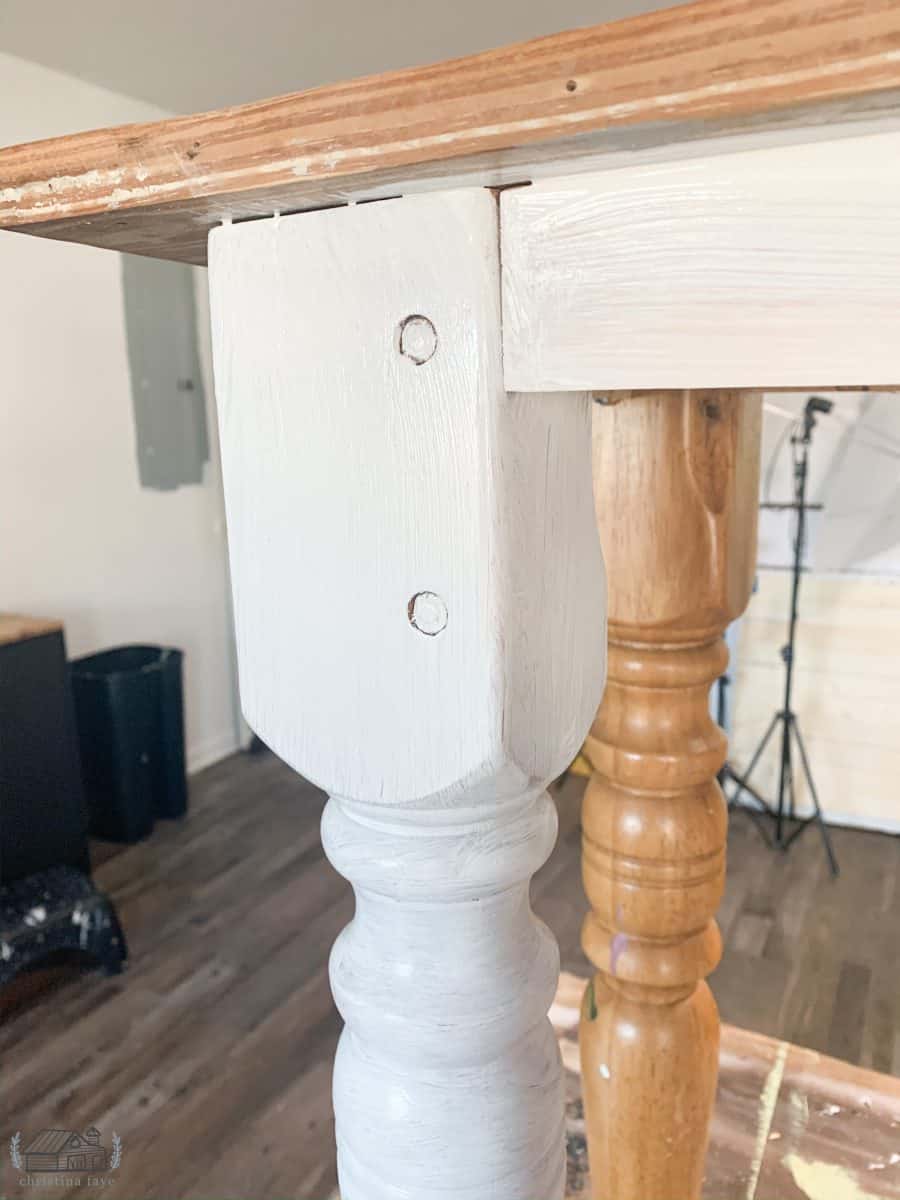 Table leg painted with one coat of Dixie Belle Cotton.