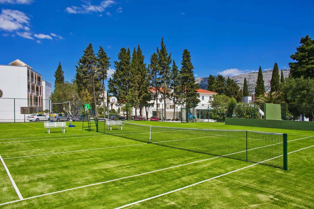 Tennis court is among various facilities of Port 9 resort