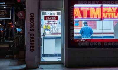 atm booth with neon signage