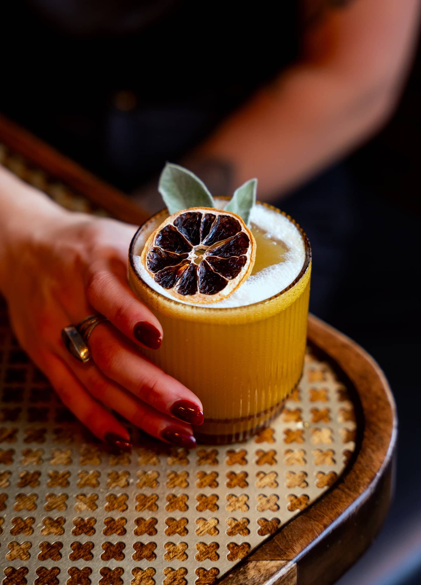 Redlight Dayvan Cowboy: a sage bourbon sour
