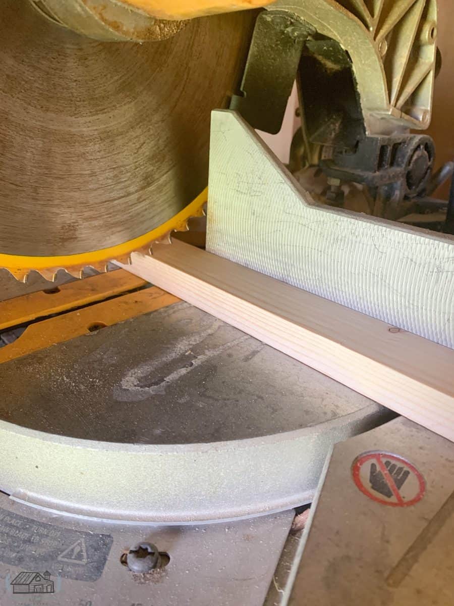 Cutting the piece short with saw