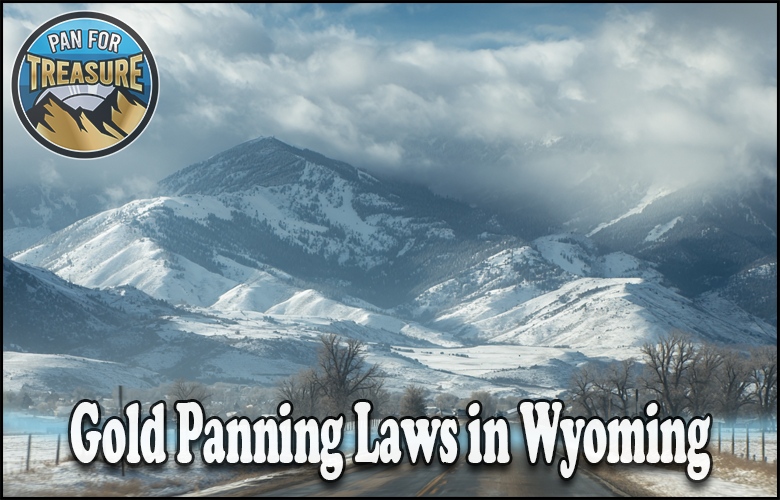 Snow-covered mountains under a partly cloudy sky in Wyoming. Text reads “Gold Panning Laws in Wyoming”—highlighting the state's treasure hunting rules—with a “Pan for Treasure” logo in the top left corner.
