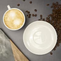 Coffeeness Cappuccino-Tasse von oben mit Untertasse