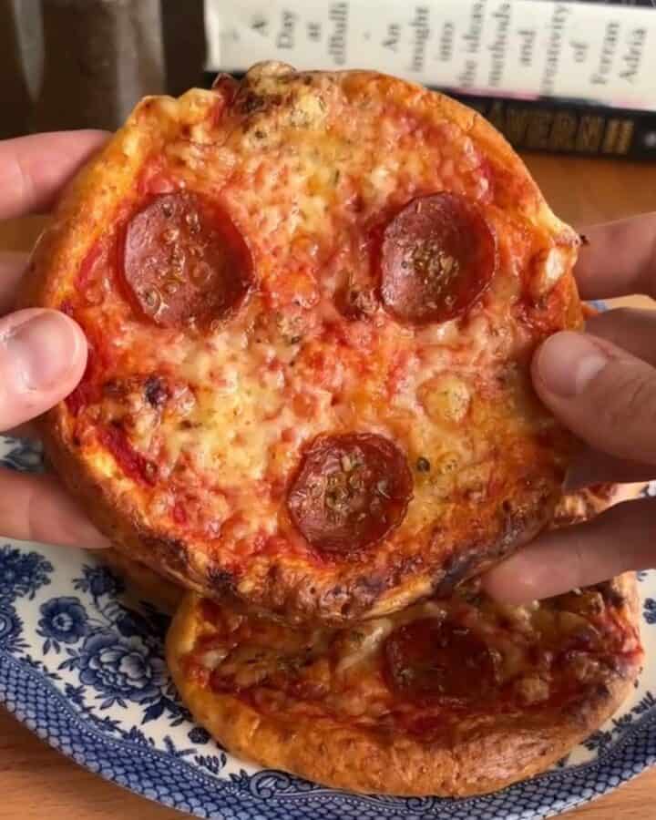 a mini pepperoni pizza made with cottage cheese crust and melty cheese