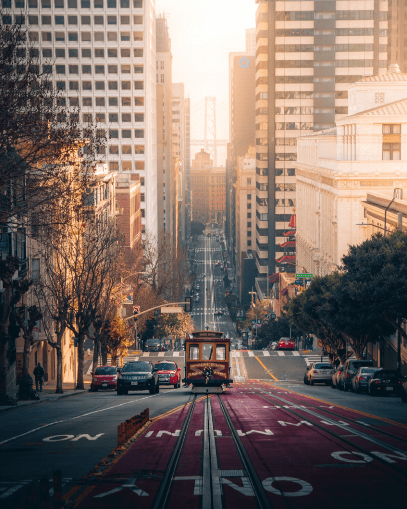 view behind tram going down hill in san francisco