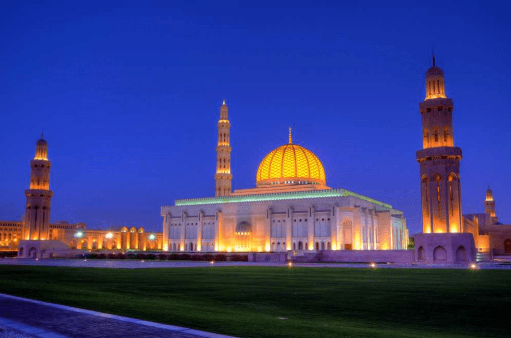 brightly lit mosque in muscat, oman