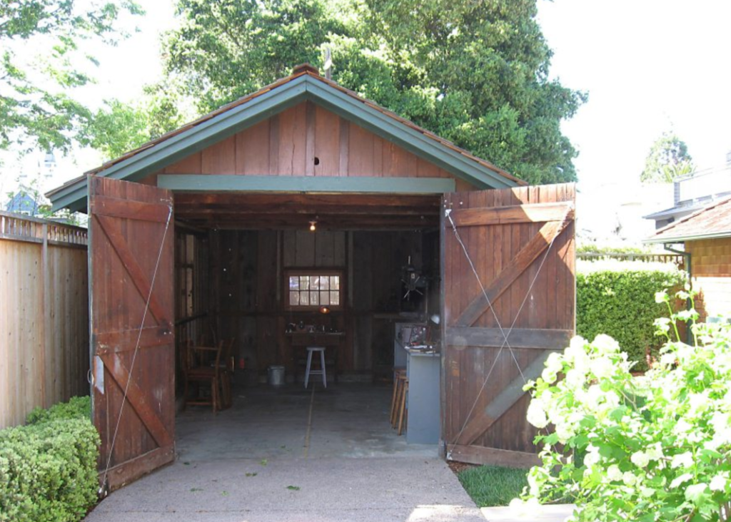 old wood shed with doors open