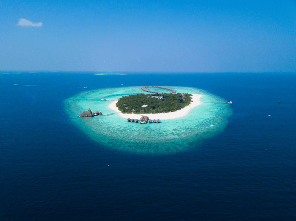 island surrounded by turquoise sea in the sun