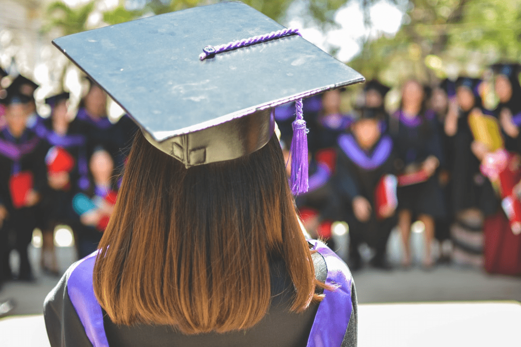 woman_wearing_academic_cap_and_dress_selective_focus_photography