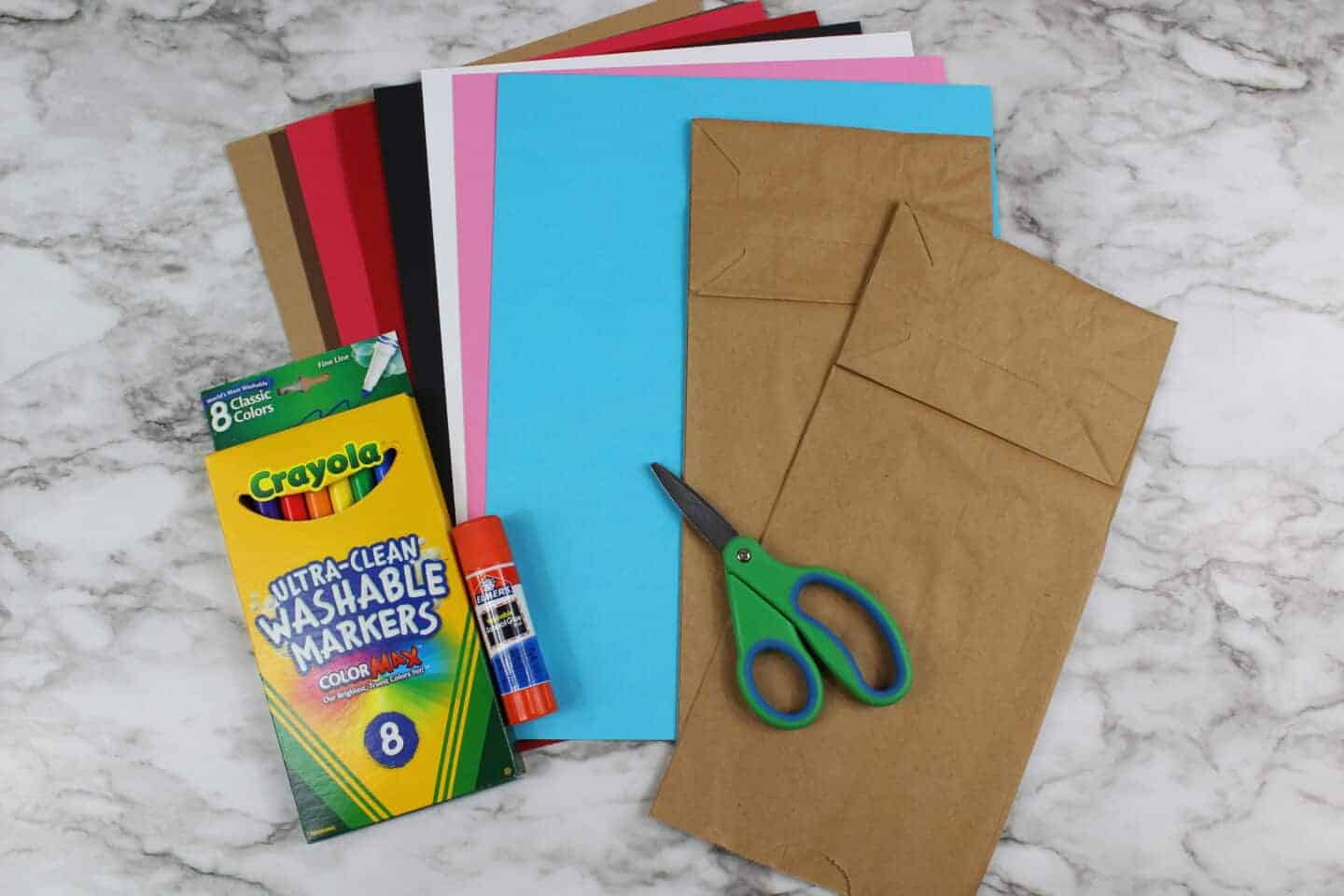 supplies needed for werewolf craft including paper bag, cardstock and crayola felts