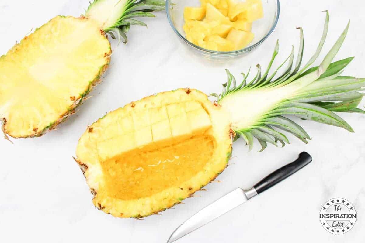 Pineapple cut into halves.