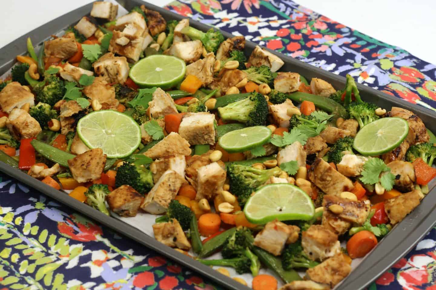 Healthy chicken satay on a sheet pan.