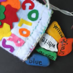 Colorful painted rocks and a pouch.