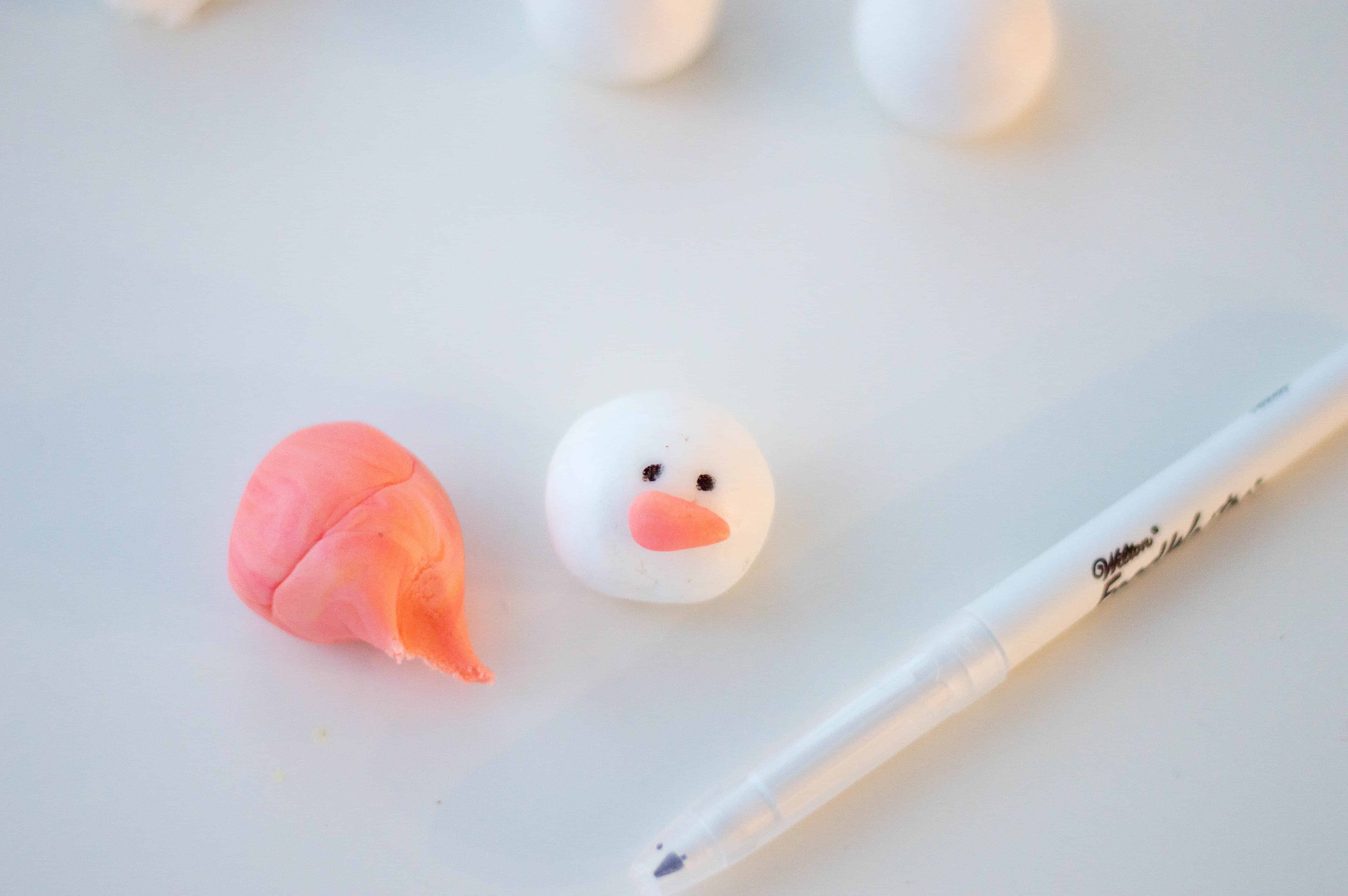 making oreo truffle snowman
