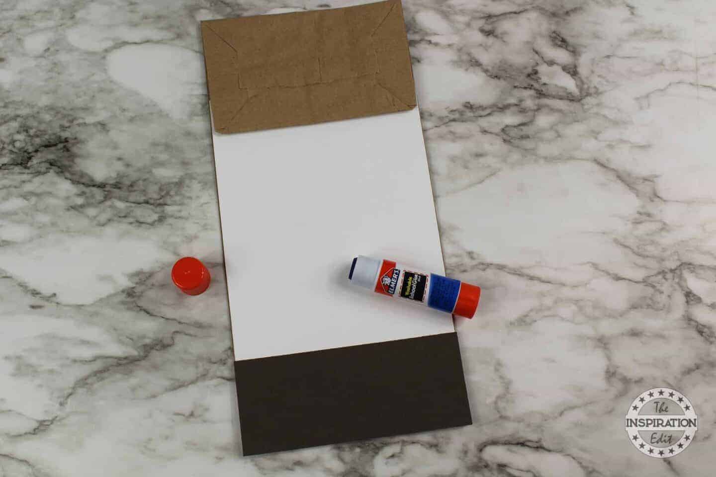 using a brown paper bag to make a vampire puppet