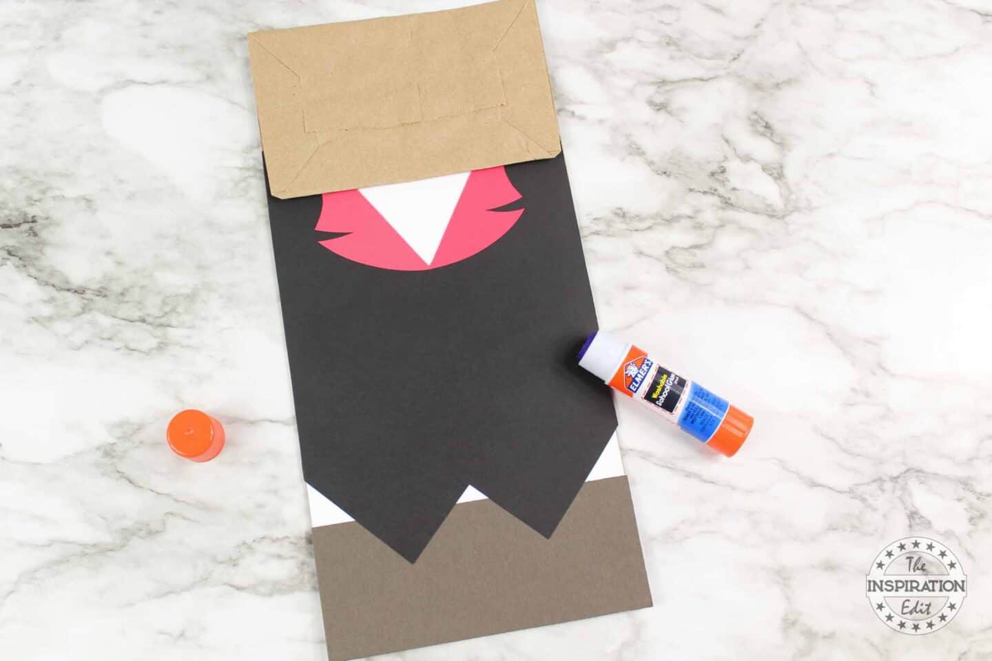 adding a vampire costume to the paper bag vampire