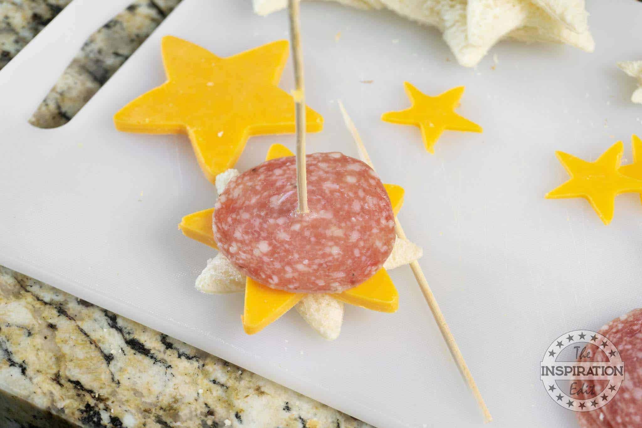 Preparing Christmas tree sandwiches.