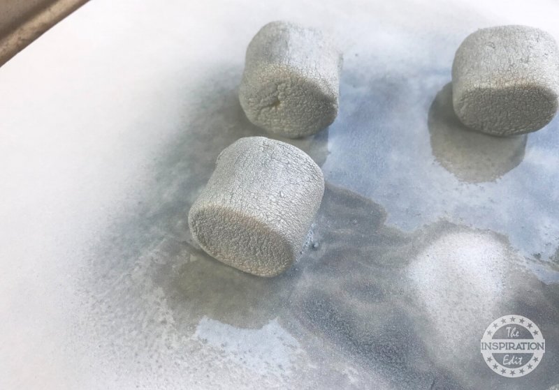 Grey color sprayed on marshmallows.