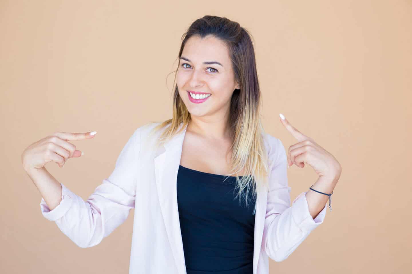 Cheerful Pretty Young Woman Proud of Herself.