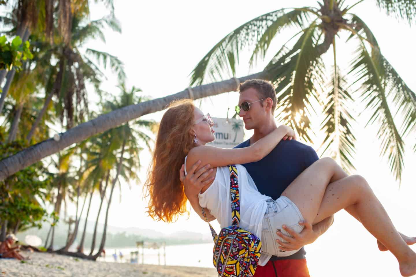 Young Couple in Love, Happy on Summer Beach Together, Having Fun.