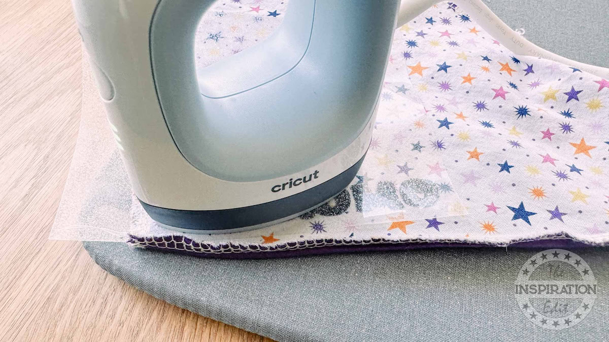 Cricut EasyPress Mini Zen Blue | Ironing the Logo on to fabric.
