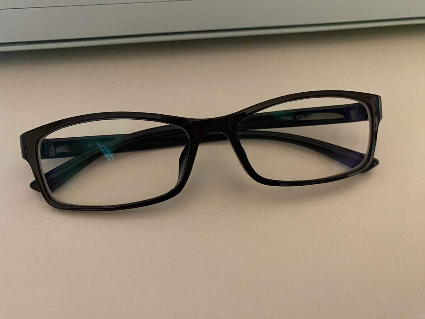 Getting Glasses for My Daughter. a pair fo black frames.