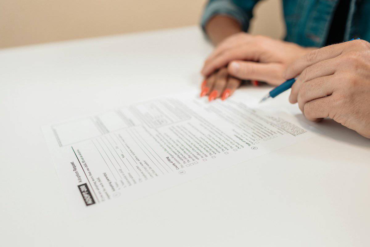 Family Law Support for Women | Signing Legal Documents after a divorce.