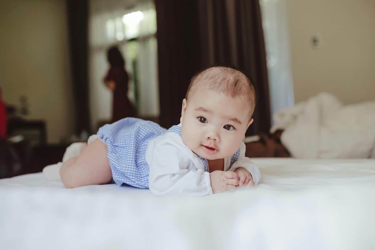 Techniques For Busy Parents | Baby Crawling on its tummy.
