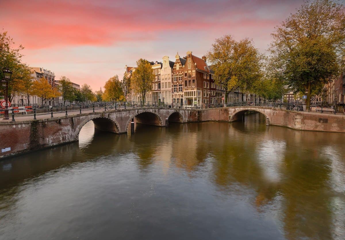 Different Side of Amsterdam | Streets of Amsterdam with a gorgeous sunset.