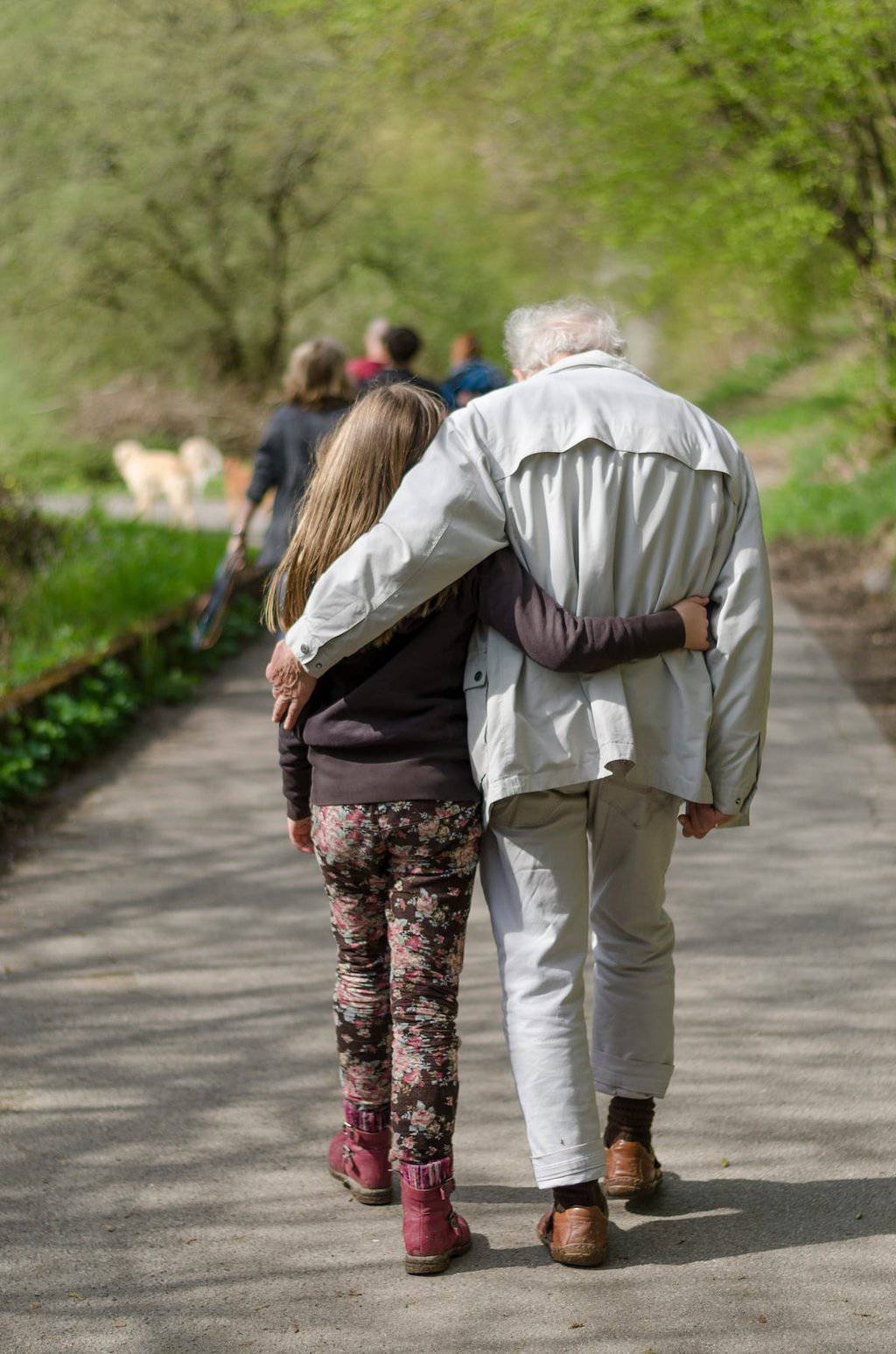 Strong Through Legal And Financial Struggles | A grandpa comforting his Granddaughter.