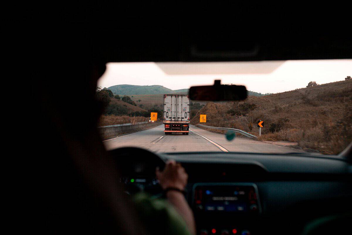 Truck Accidents | A Car following safely behind a Truck.