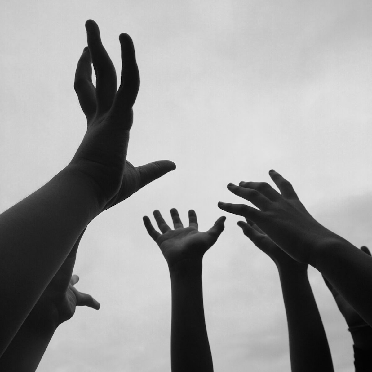 personalized depression treatments | cropped hands people against sky.