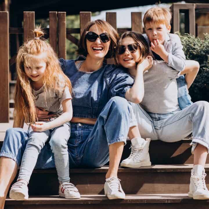 How to Dress Kids for Summer Fun | Mother with her children in the backyard.