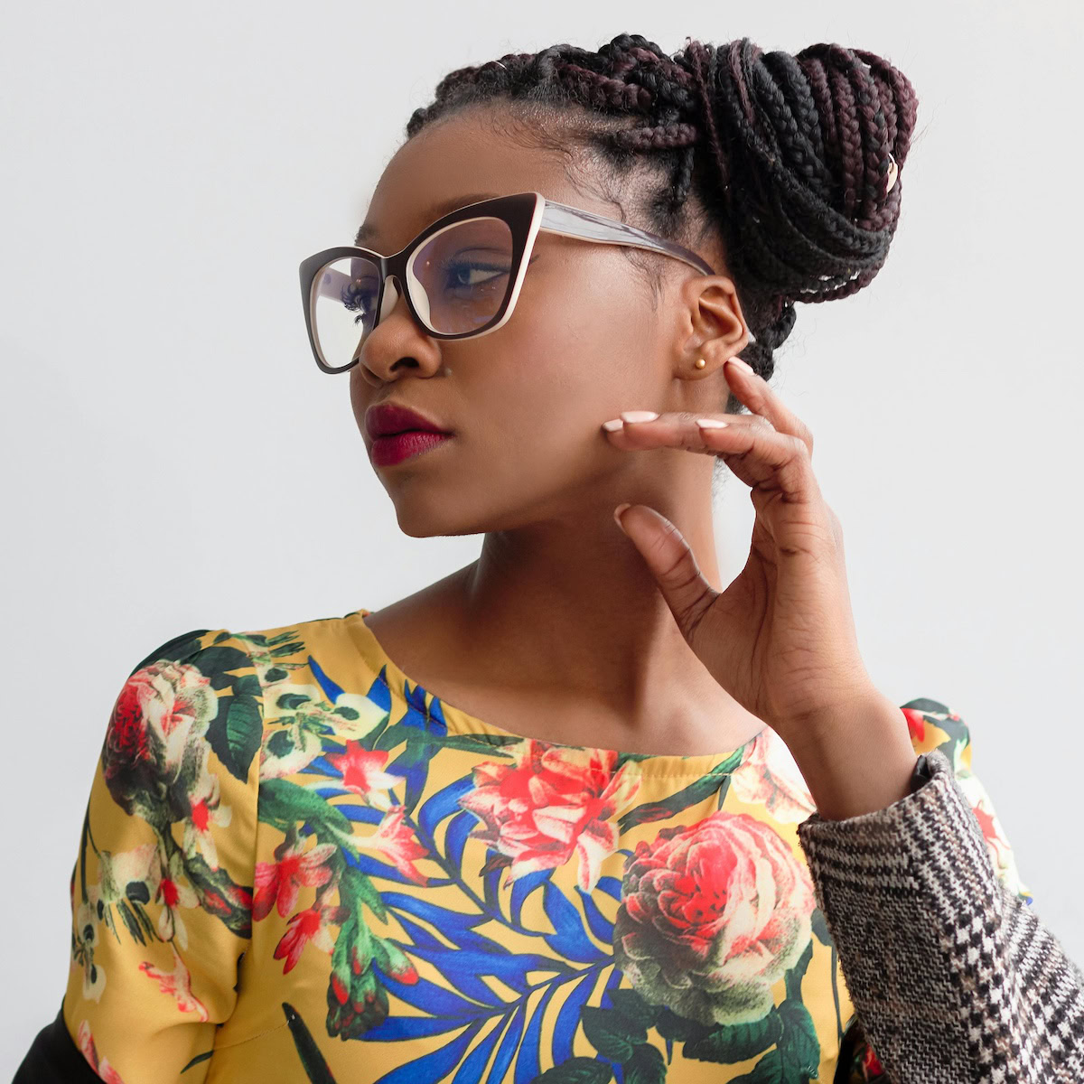 Perfect eye frames for your look | Woman wearing new eye glasses to suit her look.