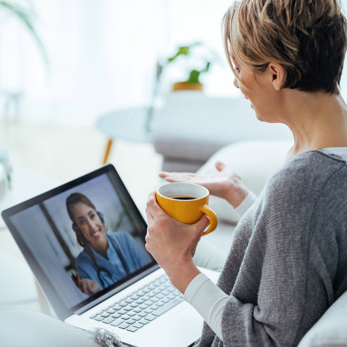 Therapy’s Getting a Makeover | woman using laptop having video cal her Therapist.