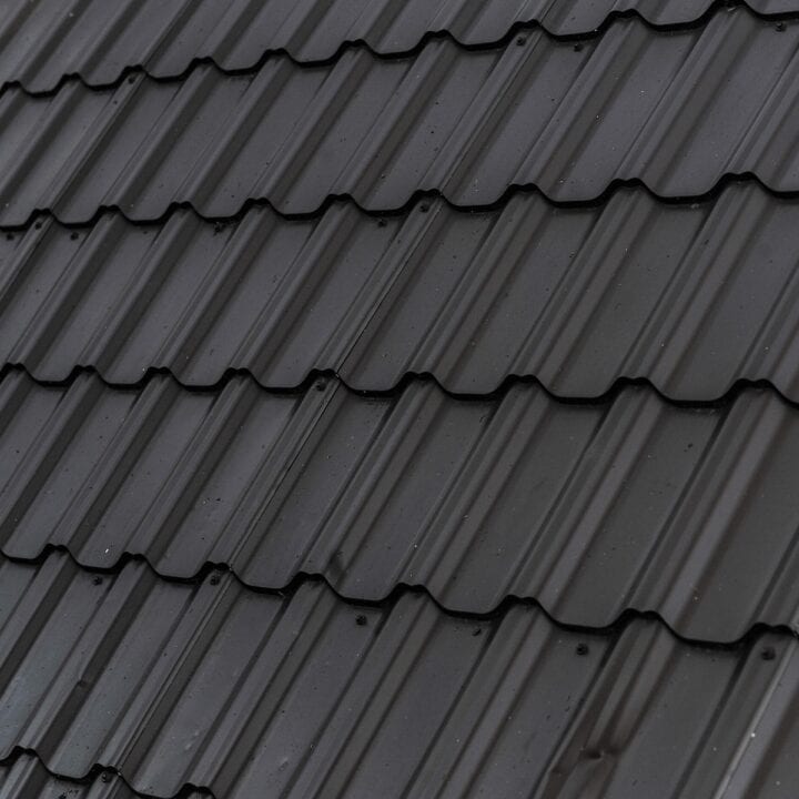 What to Know Before Replacing Your Roof | A new metal roof after installation.