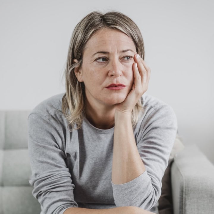 adult woman sad after trauma.