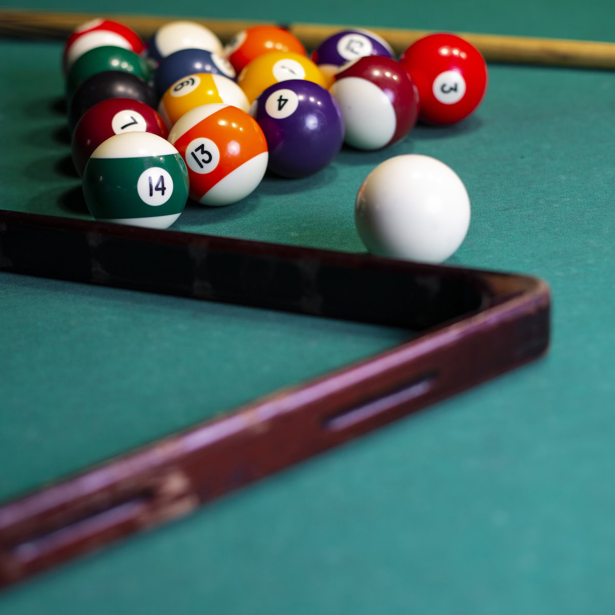 pool cue and pool balls.