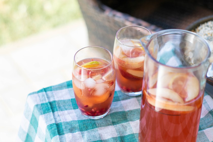 Ginger Peach Lemon Bourbon in two glasses and glass pitcher
