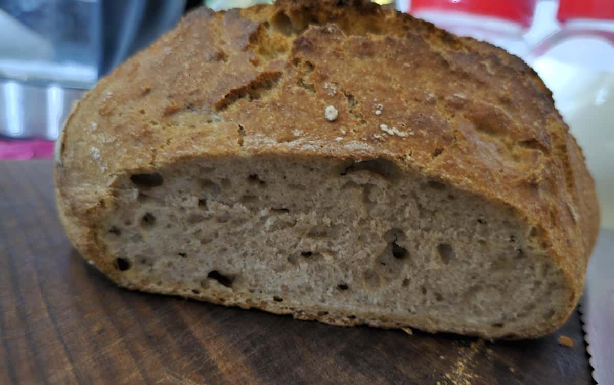 the crumb of a zea and white flour loaf of bread