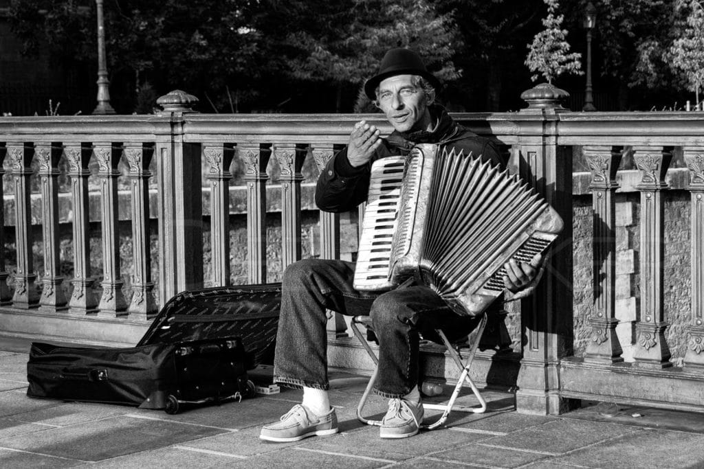Accordian Player - Blow Me a Kiss Paris_Street_10-Edit-Edit-Edit.psd Houston Commercial Architectural Photographer Dee Zunker