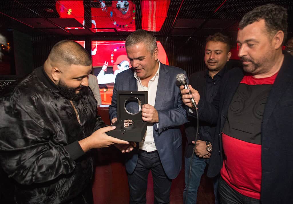 Ricardo Guadalupe presenting timepiece to DJ Khaled