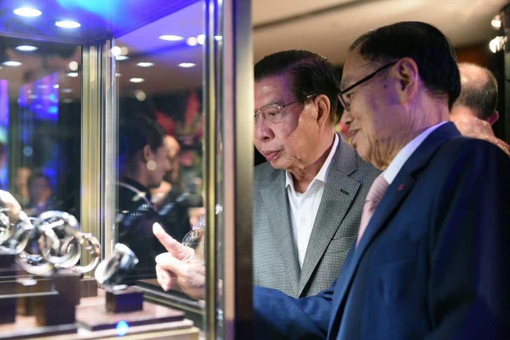 Mr. Anthony Lim showing a guest around the Calendar timepiece showcase