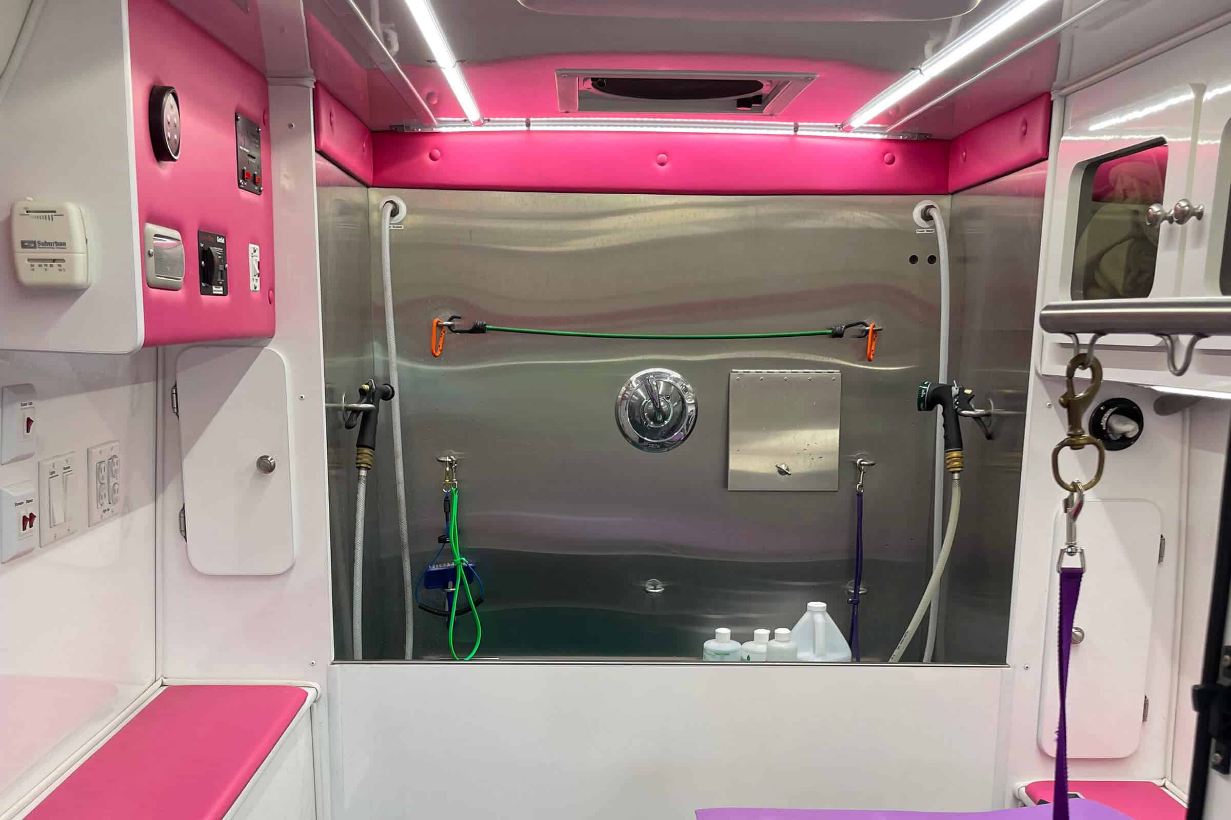 Interior view of the Paw Shapers Mobile Grooming Van showcasing the Wash Station.