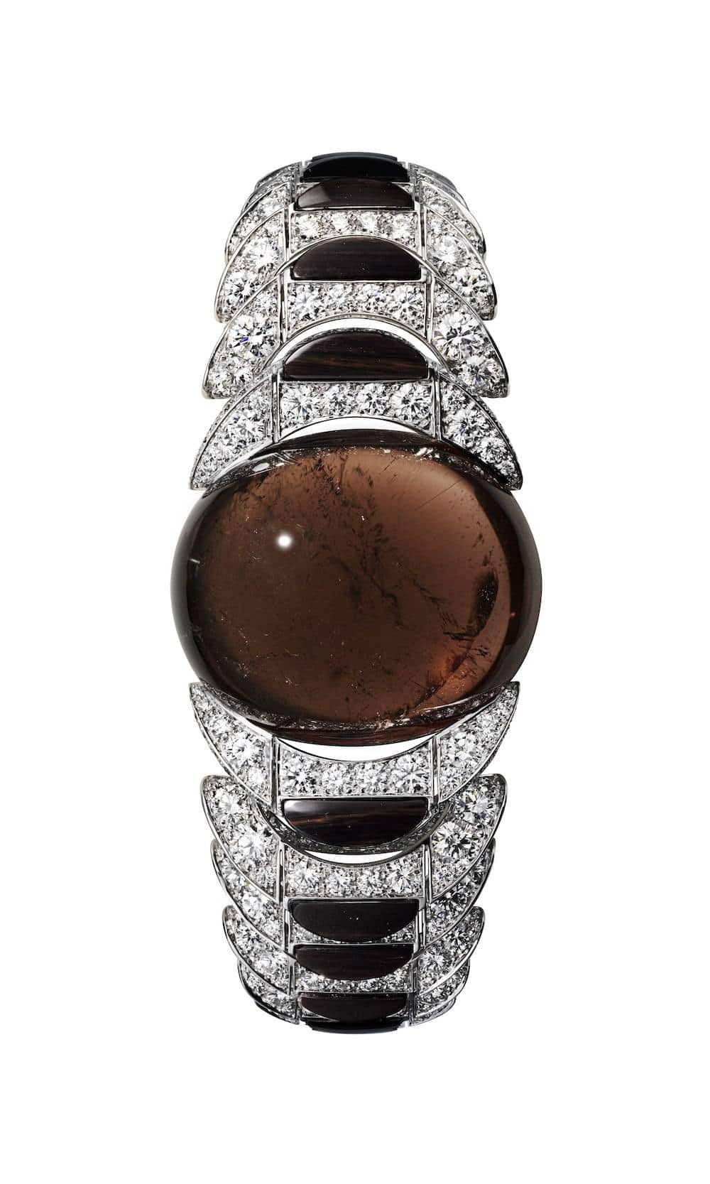 White gold bracelet with one 88.73-carat cabochon-cut brown tourmaline, obsidian, brilliants