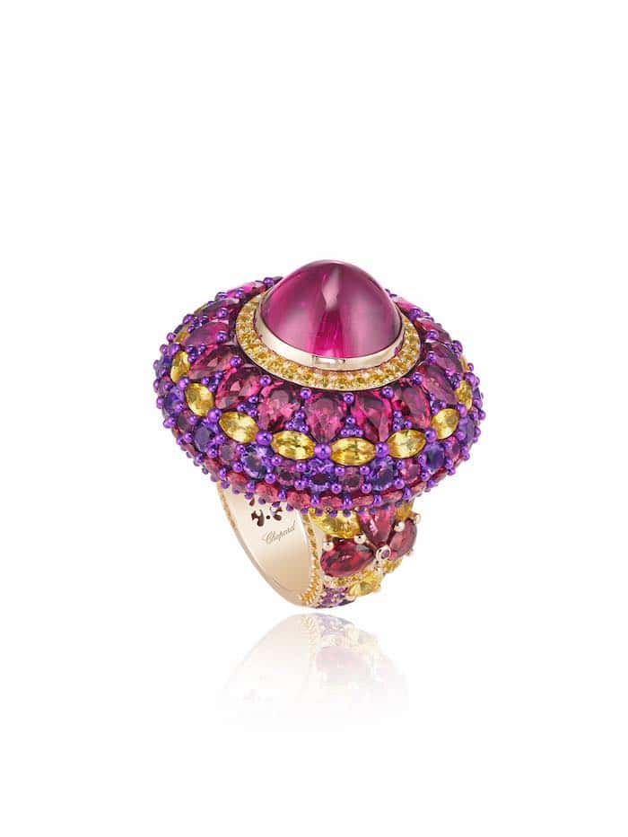 Red Carpet Ring in 18ct rose gold and titanium featuring a 9.6cts rubellite cabochon and set with fancy-cut rubellites (12.2cts), fancy-cut yellow sapphires (5.5cts) and brilliant-cut amethysts (2.6cts)