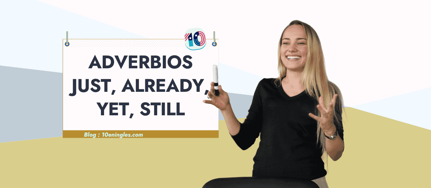 Mujer sonriendo sosteniendo un rotulador frente a un cartel con la frase "Adverbios Just, Already, Yet, Still".